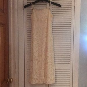 Beautiful cream dress. Perfect for a special day.